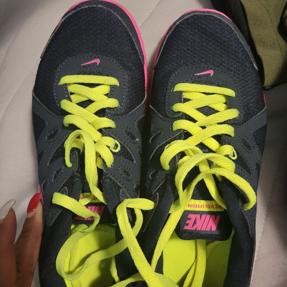 Nike Women's Dark Gray Athletic Sneakers with Neon Yellow & Pink Accents